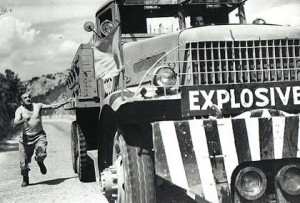 man runs after explosives truck, scene from the Wages of Fear
